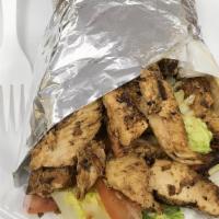 Shawarma Wrap · Marinated grilled chicken meat with lettuce, tomatoes, onions and our in-house made tzatziki...