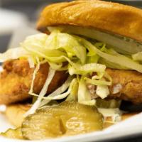 Lil Weezy Ana · Rosemary buttermilk fried chicken, dill pickle, shaved white onion, buttermilk dressing, shr...