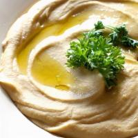 Hummus · Chickpeas, Tahini sauce, Lemon, Olive oil Salt & spices Add Large pita Bread for an addition...