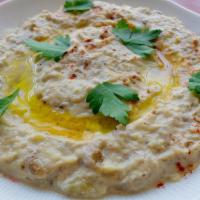 Baba Ganoush · Roasted Eggplant Tahini Sauce, Lemon Olive oil, salt & spices. Add Large pita bread for an a...