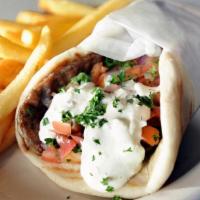 Gyro & Fries · Greek Blend meat with spices Grilled with onion creek, top off with tzatziki sauce tomato & ...
