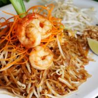 Pad Thai · Stir-fried small rice noodles with egg, bean sprout, chive and top with crushed peanut