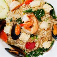 Siamese Fried Rice · Jasmine rice stir-fried with garlic, egg, broccoli, tomato, onion and cucumber