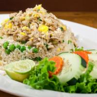 Crab Fried Rice · Fried rice with crab meat, egg, green onion, peas, cucumber, carrot, lime and cilantro