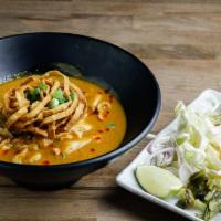 Khao Soi · Choice of Tofu & Vegetable, Chicken or Shrimp Northern Thai Style Egg Noodle with chicken in...