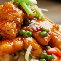 Chili Fish · Crispy fillet fish, peas, carrots, red bell peppers and green onions with spicy Thai chili s...