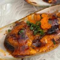 Dynamite Mussels · Baked mussels topped with masago, . spicy mayo, scallions & eel sauce