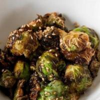 Brussel Sprouts · Sauteed brussel sprouts in citrus-soy . miso sauce