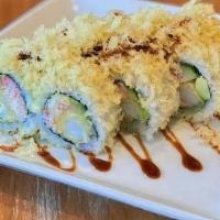 Crunchy Roll · Shrimp tempura, crab, avocado, cucumber, . tempura flakes and drizzled with eel sauce.
