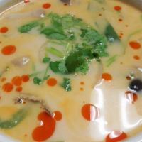 Tom Kha Kai · Hot. Coconut milk, mushroom, onion, bell pepper, galangal and lime juice served with chicken.