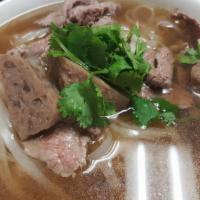 Beef & Beef Meat Balls Soup · Rice noodles with bean sprouts in beef broth.