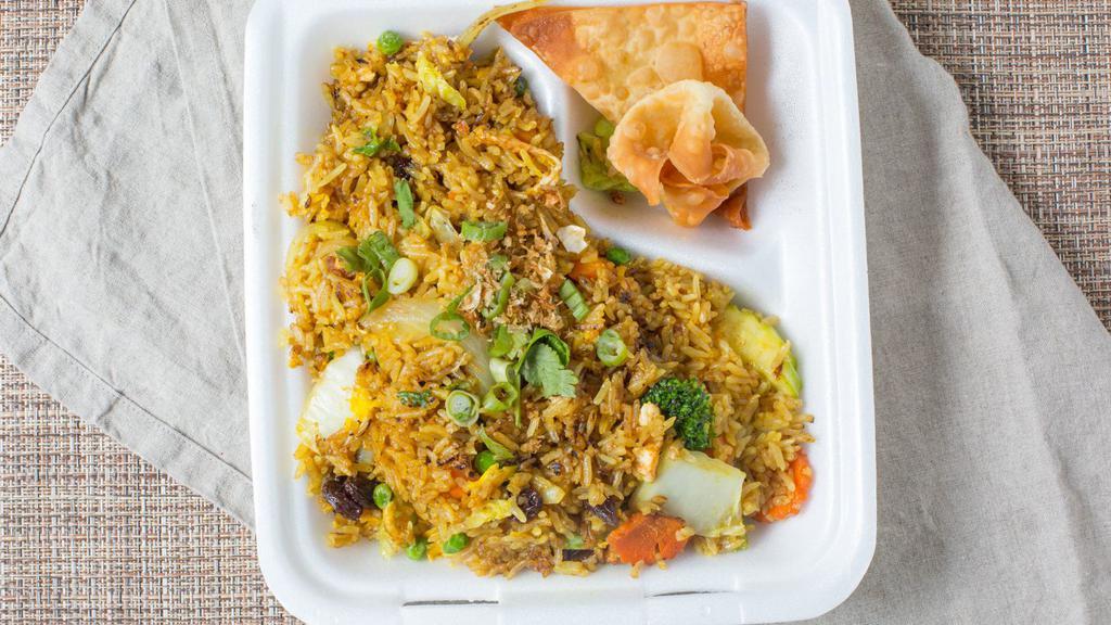 Curry Fried Rice · Curry powder, raisin, carrot, onion, peas and egg