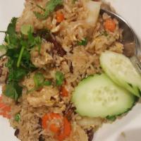 Chinese Sausage Fried Rice · Chinese sausage, peas and carrot, onion, napa cabbage and egg.