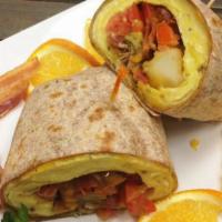 Omelette Wrap · 3 Organic eggs, Organic tomatoes, bacon, Organic fresh avocado, cheddar and mozzarella chees...