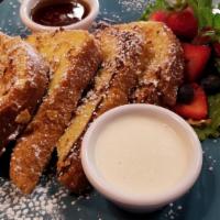 Vanilla French Toast · Cornflake crusted slices of sourdough bread topped with vanilla cream Fraiche and served wit...