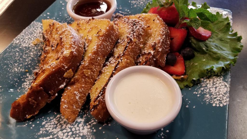 Vanilla French Toast · Cornflake crusted slices of sourdough bread topped with vanilla cream Fraiche and served with a side of Organic fresh fruit compote & Canadian maple syrup.
Available 7 days a week, 7am -3:30pm.
