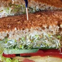 Garden Veggie Sandwich · Roasted peppers, grilled zucchini, cucumber, tomato, alfalfa sprouts, humus and olive tapena...