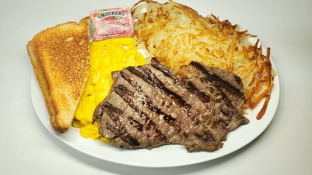 7Oz Steak & Eggs · 7 oz Steak, Three Eggs, Hash brown and two Slices of Toast + Smuckers Jelly.