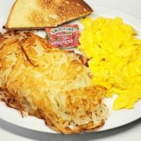 Hash Brown & Eggs · Three Eggs, Hash brown and two Slices of Toast + Jelly.