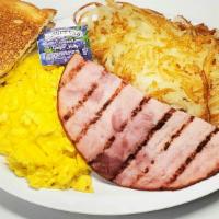 Ham & Eggs · Three Eggs, one Slice of Ham, Hash brown and two Slices of Toast + Jelly