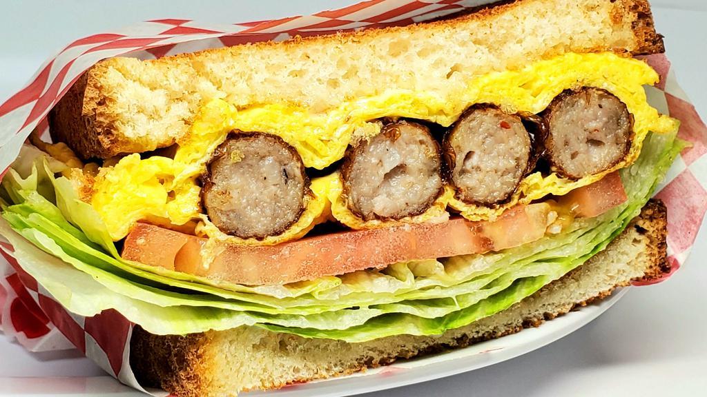 Sausage & Egg Sandwich · Served with meat, choice of bread, three eggs, mayo, lettuce, tomato. Please contact the merchant for bread selection.