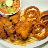Fried Chicken Dinner Plate · One breast, one wing, one thigh,one leg, fries & few onion rings ri rice & beans, salad, one...