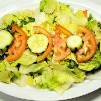 Green Salad- Small · Lettuce, cucumber, tomato, carrots, purple cabbage, choice of dressing.