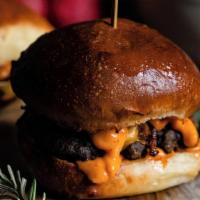 Kobe Beef Sliders · Cheddar cheese, caramelized onions, chipotle mayo.