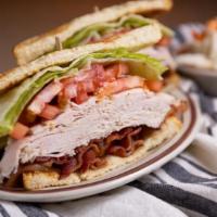 Turkey Club Sandwich - Lighter Portion · Turkey, bacon, lettuce & tomato on toasted sourdough.