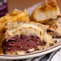 Reuben Sandwich - Lighter Portion · Choice of turkey, pastrami or corned beef, Swiss cheese, sauerkraut, Russian dressing on gri...