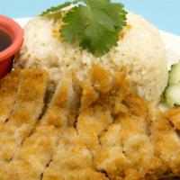 Thai 9 Fried Chicken · Chicken breast meat seasoned and gold fried. Served with garlic fried rice and salad