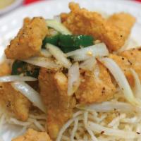 Crispy Calamari / Mực Rang Muối · Deep fried calamari, sautéed with bell peppers, onion, garlic, and a touch of black pepper. ...