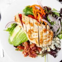 Anny'S Cobb Salad With Chicken · Crisp mixed greens with bacon, tomato, avocado, red onion, crumbled blue cheese and blue che...