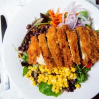 Crispy Chicken Salad · Fried chicken, roasted corn, black bean, carrots, tomatoes and red onion.