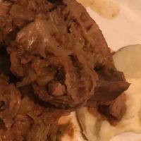 Brasato · Braised beef short ribs with mashed potatoes.