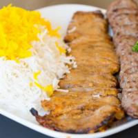 Chicken Barg & Beef Koobideh · Served with basmati saffron rice and charbroiled tomato.