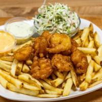 Battered Shrimp And Chips · With hand made French fries and coleslaw.