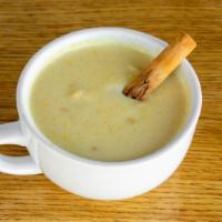 Atol De Elote · Creamy warm corn, cinnamon, sugar and milk drink. Traditional favorite.