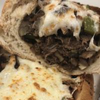 Philly Steak Combo Sandwich · Sliced steak with bell peppers, onions and mushrooms topped with melted cheese on a 10