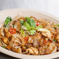 Spicy Basil Drunken Noodles · Stri-fry wide rice noodles, chili vegetables and basil leaves.