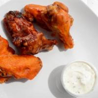 Wings · Buffalo, BBQ, Mango Habanero, Plain. Served with Ranch Dipping Sauce.