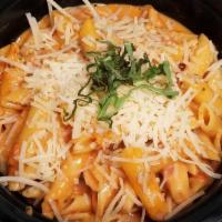 Penne With A Tomato Cream Sauce · All pastas are garnished with fresh basil and parmigiana cheese and are served with a side o...