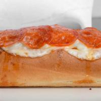 Grande Grinder · Meatballs, sausage, pepperoni, grilled onions, bell, peppers, marinara and provolone.