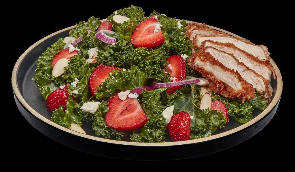 Kale Salad With Strawberries · Kale salad with balsamic vinaigrette dressing, strawberries, feta cheese, and sliced almonds with optional  protein of your choice.