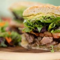 Ahi Tuna Sandwich · Grilled Ahi tuna steak with organic arugula, tomato, and our special spread on Rosemary Bread