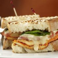 Chicken Kabob Panini · Chicken kabob with sundried tomatoes, caper and olive spread, and mozzarella cheese