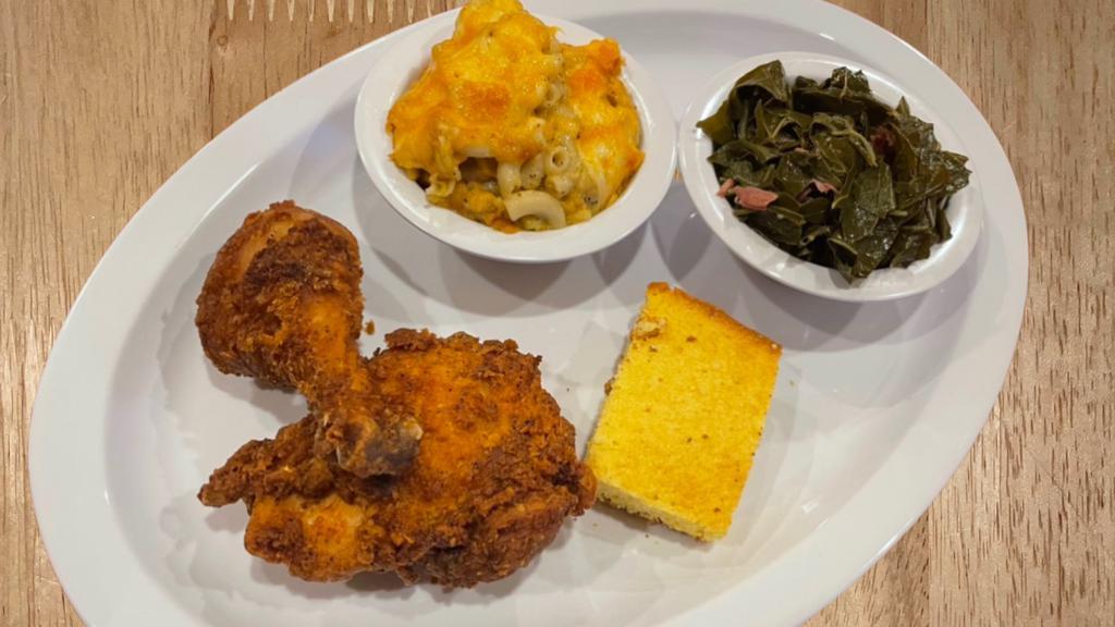 J'S Fried Chicken - No.1 Combo · One thigh, one leg with original spices and choice of two sides with cornbread.