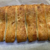 Garlic Breadsticks (8 Pieces) · Freshly baked bread sticks. Served with a side of marinara sauce.