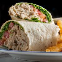 Fish Burrito · Rice, pico de gallo, cabbage and creamy sauce.