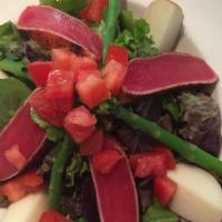 Seared Ahi Salad · Gluten-free. Blackened ahi seared rare baby greens, diced tomatoes, broccolini, red potatoes...